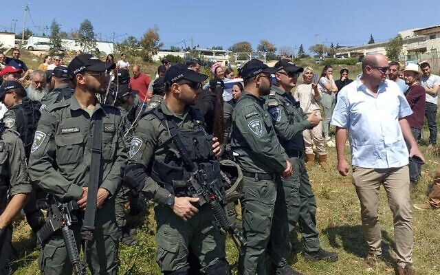 Security forces securing area as Civil Administration uproots trees planted by settlers on private Palestinian land, March 21, 2024 (Gush Etzion Regional Council) Security forces securing area as Civil Administration uproots trees planted by settlers on private Palestinian land, March 21, 2024 (Gush Etzion Regional Council)