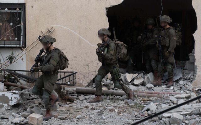 Troops of the 98th Division operate in Khan Younis, in a handout image published March 4, 2024. (Israel Defense Forces) Troops of the 98th Division operate in Khan Younis, in a handout image published March 4, 2024. (Israel Defense Forces)