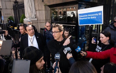 Israeli professor Shai Davidai speaks to reporters outside Columbia University in New York, April 22, 2024. (Luke Tress/JTA)