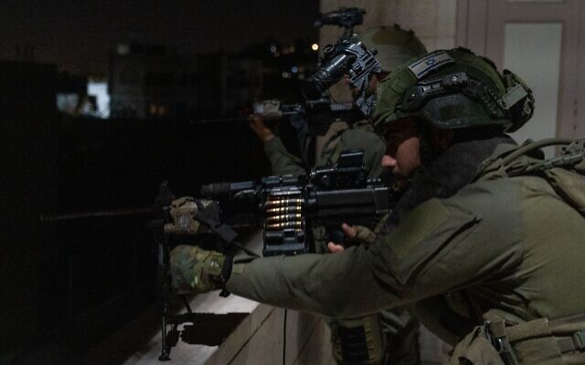 Troops operating in Dura, hometown of the terrorist who carried out Gan Yavne attack, April 1, 2024 (Israel Defense Forces) Troops operating in Dura, hometown of the terrorist who carried out Gan Yavne attack, April 1, 2024 (Israel Defense Forces)
