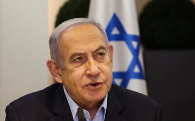 File - Prime Minister Benjamin Netanyahu heads the weekly cabinet meeting at the Defense Ministry in Tel Aviv on January 7, 2024. (RONEN ZVULUN / POOL / AFP)