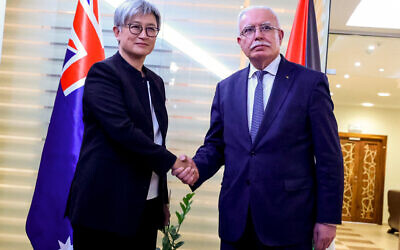 File - Palestinian Foreign Minister Riyad al-Maliki (R) receives Australian Foreign Minister Penny Wong (L), in Palestinian Authority-controlled Ramallah, in the West Bank, January 17, 2024. (Jaafar Ashtiyeh/AFP)