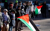 Demonstrators call for a ceasefire in the Israel-Hamas war in Gaza on the University of Michigan campus in Ann Arbor, Michigan, on February 20, 2024. (Jeff Kowalsky/AFP)