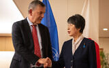 Japan's Foreign Minister Yoko Kamikawa (R) and UNRWA Commissioner General Philippe Lazzarini (L) prior to a meeting at the Ministry of Foreign Affairs in Tokyo on March 28, 2024. (Yuichi Yamazaki/AFP)