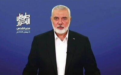 Ismail Haniyeh, the Doha-based political bureau chief of the Palestinian terror group Hamas, speaks on a televised speech on the occasion of Quds (Jerusalem) Day on April 3, 2024. (Hamas Media Office/AFP)