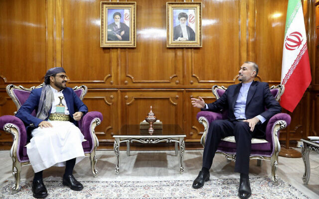 This handout picture provided by the Iranian foreign ministry on April 7, 2024, shows Foreign Minister Hossein Amir Abdollahian (R) meeting with Mohammad Abdul Salam, spokesman for the Yemen's Houthi movement, in Muscat. (Photo by Iranian Foreign Ministry / AFP)