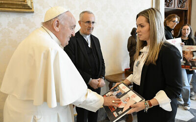 Pope Francis meets at the Vatican with relatives of Shiri, Yarden, Ariel and Kfir Bibas, who have been held hostage in Gaza since October 7, on April 8, 2024. (Vatican Media handout via AFP)
