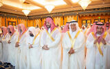 A handout picture provided by the Saudi Press Agency (SPA) shows Saudi Crown Prince Mohammed bin Salman (3R) performing the Eid Al-Fitr prayer at the Grand Mosque in the holy city of Mecca on April 10, 2024. (Photo by SAUDI PRESS AGENCY / AFP) /