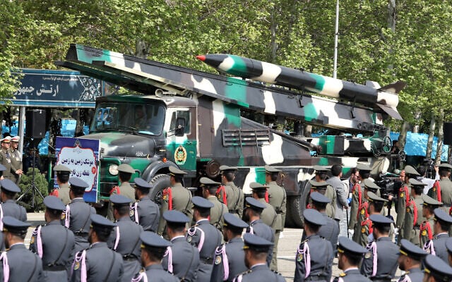 An Iranian military truck carries missiles during a military parade as part of a ceremony marking the country's annual army day in Tehran on April 17, 2024. (Atta Kenare/AFP) An Iranian military truck carries missiles during a military parade as part of a ceremony marking the country's annual army day in Tehran on April 17, 2024. (Atta Kenare/AFP)