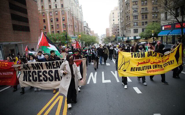 Pro-Palestinian, anti-Israel protesters march outside Columbia University in New York City on April 18, 2024. (Kena Betancur / AFP) Pro-Palestinian, anti-Israel protesters march outside Columbia University in New York City on April 18, 2024. (Kena Betancur / AFP)