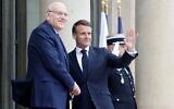 French President Emmanuel Macron (R) welcomes Lebanese Prime Minister Najib Mikati (L) before a meeting at the Elysee Palace in Paris on April 19, 2024. (Ludovic Marin/AFP)
