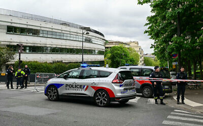 French police officers take part in a security perimeter near the consulate of Iran in Paris on April 19, 2024. (Miguel Medina/AFP)