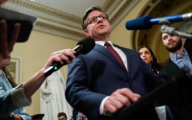 US Speaker of the House Mike Johnson speaks to the press after the House passed a major aid package for Ukraine, Israel, and Taiwan and also voted to ban TikTok at the US Capitol in Washington, DC, on April 20, 2024. (Drew Angerer/AFP)