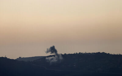 This picture taken from an Israeli position along the border with southern Lebanon shows smoke billowing above the Lebanese village of Odaisseh during Israeli strike on April 22, 2024(Photo by Jalaa MAREY / AFP)