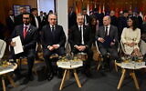 UAE's Special Envoy for Climate Change Sultan Ahmed Al Jaber (L),  Azerbaijan's Minister of Ecology and Natural Resources and COP29 President Mukhtar Babayev (2nd L), Azerbaijan's President Heydar Aliyev (C), German Chancellor Olaf Scholz (2nd R) and German Foreign Minister Annalena Baerbock are seen at the beginning of the second and last day of the Petersberg Climate Dialogue meeting in Berlin, Germany on April 26, 2024. (John MacDougall JOHN/AFP)