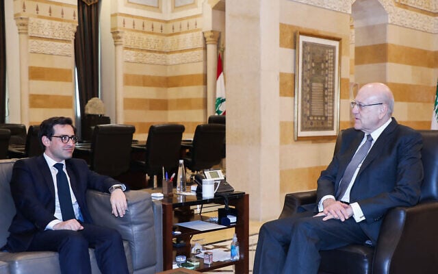 This handout picture provided by the Lebanese photo agency Dalati and Nohra shows France's Foreign Minister Stephane Sejourne (L) meeting with Lebanon's caretaker Prime Minister Najib Mikati, in Beirut, on April 28, 2024. (DALATI AND NOHRA / AFP) This handout picture provided by the Lebanese photo agency Dalati and Nohra shows France's Foreign Minister Stephane Sejourne (L) meeting with Lebanon's caretaker Prime Minister Najib Mikati, in Beirut, on April 28, 2024. (DALATI AND NOHRA / AFP)