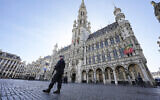 Illustrative photo of Belgian Police patrolling the Grand Place in central Brussels on October 17, 2023, following the shooting of two Swedish soccer fans by a suspected Tunisian extremist. (AP/Martin Meissner)