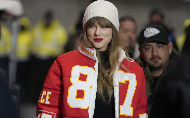 FILE - Taylor Swift arrives at an NFL wild-card playoff football game between the Chiefs and the Miami Dolphins, Saturday, Jan. 13, 2024, in Kansas City, Missouri. (AP Photo/Ed Zurga, File) FILE - Taylor Swift arrives at an NFL wild-card playoff football game between the Chiefs and the Miami Dolphins, Saturday, Jan. 13, 2024, in Kansas City, Missouri. (AP Photo/Ed Zurga, File)