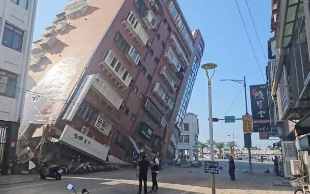 In this image taken from a video footage run by TVBS, a partially collapsed building is seen in Hualien, eastern Taiwan on Wednesday, April 3, 2024 (TVBS via AP) In this image taken from a video footage run by TVBS, a partially collapsed building is seen in Hualien, eastern Taiwan on Wednesday, April 3, 2024 (TVBS via AP)