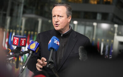 British Foreign Secretary David Cameron speaks with the media as he arrives for a meeting of NATO foreign ministers at NATO headquarters in Brussels, April 3, 2024. Virginia Mayo/AP)