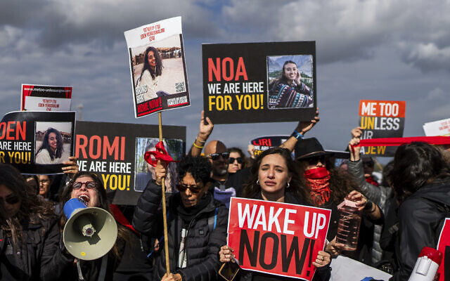 Relatives and supporters of the Israeli hostages held in the Gaza Strip by the Hamas terror group attend a march calling for their release near Kibbutz Urim, southern Israel on Friday, January 12, 2024. (AP/Ohad Zwigenberg, File)