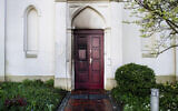 Traces of fire can be seen on a synagogue entrance door damaged by an incendiary device in Oldenburg, Germany, April 5, 2024. (Hauke-Christian Dittrich/dpa via AP)