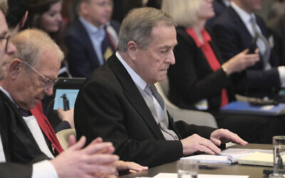 Nicaragua's Ambassador Carlos Jose Arguello Gomez, center, waits for the start of a two days hearing at the World Court in The Hague, Netherlands, Monday, April 8, 2024, in a case brought by Nicaragua accusing Germany of breaching the genocide convention by providing arms and support to Israel. (AP Photo/Patrick Post)