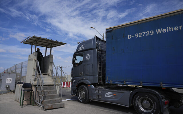 A truck carrying humanitarian aid for the Gaza Strip passes through the Kerem Shalom Crossing in southern Israel, Thursday, March 14, 2024 (AP Photo/Ohad Zwigenberg, File) A truck carrying humanitarian aid for the Gaza Strip passes through the Kerem Shalom Crossing in southern Israel, Thursday, March 14, 2024 (AP Photo/Ohad Zwigenberg, File)