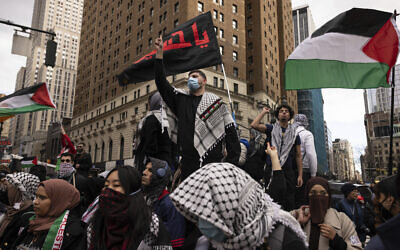 Pro-Palestinian demonstrators chant during a protest, April. 12, 2024, in New York. (AP Photo/Yuki Iwamura)