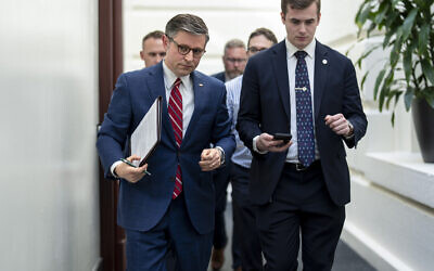 House Speaker Mike Johnson, R-La., left, arrives for a closed-door meeting with fellow Republicans at the Capitol in Washington, Monday, April 15, 2024. (AP/J. Scott Applewhite) House Speaker Mike Johnson, R-La., left, arrives for a closed-door meeting with fellow Republicans at the Capitol in Washington, Monday, April 15, 2024. (AP/J. Scott Applewhite)