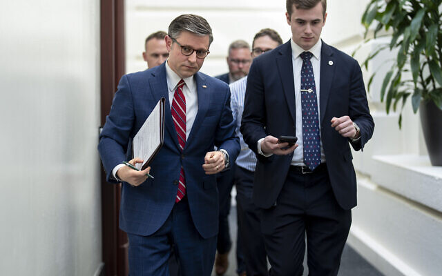 House Speaker Mike Johnson, R-La., left, arrives for a closed-door meeting with fellow Republicans at the Capitol in Washington, Monday, April 15, 2024. (AP/J. Scott Applewhite) House Speaker Mike Johnson, R-La., left, arrives for a closed-door meeting with fellow Republicans at the Capitol in Washington, Monday, April 15, 2024. (AP/J. Scott Applewhite)