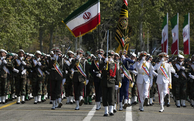 Iranian army members march during Army Day parade at a military base in northern Tehran, Iran, Wednesday, April 17, 2024. (AP Photo/Vahid Salemi)