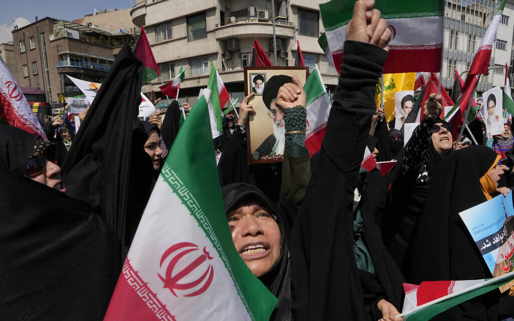 Iranian worshippers chant slogans during an anti-Israeli gathering after Friday prayers in Tehran, April 19, 2024. (AP Photo/Vahid Salemi)