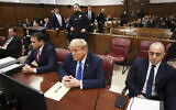 Former US President Donald Trump, center, awaits the start of proceedings at Manhattan criminal court in New York on April 22, 2024. (AP/Yuki Iwamura, Pool)