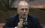 Palestinian Authority Prime Minister Mohammad Mustafa speaking to journalists in the West Bank town of Tulkarem on April 22, 2024. (AP/Majdi Mohammed)