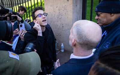 Columbia University assistant professor Shai Davidai is denied access to the main campus after his security card was deactivated to prevent him from accessing the lawn currently occupied by pro-Palestine student demonstrators in New York, April 22, 2024. (AP Photo/Stefan Jeremiah)