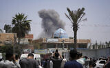 Smoke rises following an Israeli airstrike in Deir al Balah, Gaza Strip on April 23, 2024. (AP/Abdel Kareem Hana)