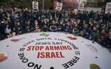 Pro-Palestinian protesters gather during a demonstration against Israel near US Senate Majority Leader Chuck Schumer's home in Brooklyn, New York City, April 23, 2024. (AP Photo/Andres Kudacki)