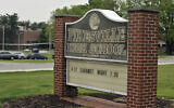 This undated photo shows the The Pikesville High School sign on the school property, in the Baltimore area, Maryland, on April 25, 2024. (Lloyd Fox/The Baltimore Sun via AP)
