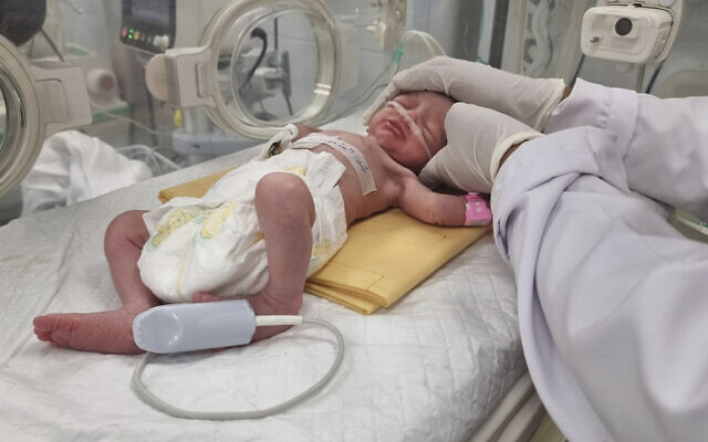 File: A Palestinian baby girl, Sabreen al-Rouh, who was delivered prematurely after her mother was killed in an Israeli strike, lies in an incubator in the Emirati hospital in Rafah, southern Gaza Strip, April 21, 2024. Her uncle and a doctor said on April 26 that she had died. (AP Photo/Mohammad Jahjouh, File) File: A Palestinian baby girl, Sabreen al-Rouh, who was delivered prematurely after her mother was killed in an Israeli strike, lies in an incubator in the Emirati hospital in Rafah, southern Gaza Strip, April 21, 2024. Her uncle and a doctor said on April 26 that she had died. (AP Photo/Mohammad Jahjouh, File)