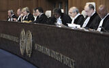 FILE - Judge Nawaf Salam, third right, speaks at the start of a two-day hearing at the World Court in The Hague, Netherlands, in a case brought by Nicaragua accusing Germany of breaching the genocide convention by providing arms and support to Israel, April 8, 2024. (Patrick Post/AP)
