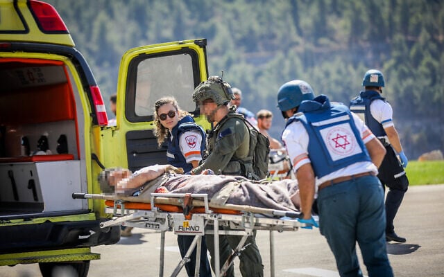 A wounded Israeli soldier from the south arrives at Hadassah Medical Center-Ein Kerem in Jerusalem, October 7, 2023. (Noam Revkin Fenton/Flash90) A wounded Israeli soldier from the south arrives at Hadassah Medical Center-Ein Kerem in Jerusalem, October 7, 2023. (Noam Revkin Fenton/Flash90)