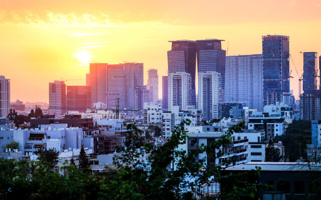 Illustrative: View of the sun over Tel Aviv. January 29, 2024. (Moshe Shai/Flash90)