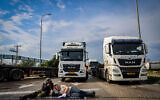Illustrative: Activists block the entrance to Ashdod port during a protest against aid trucks entering the Gaza Strip, February 1, 2024 (Photo by Chaim Goldberg/Flash90)