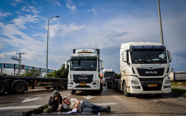 Illustrative: Activists block the entrance to Ashdod port during a protest against aid trucks entering the Gaza Strip, February 1, 2024 (Photo by Chaim Goldberg/Flash90)