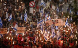 Protesters march to the President's Residence in Jerusalem on April 2, 2024 (Photo by Chaim Goldberg/Flash90)