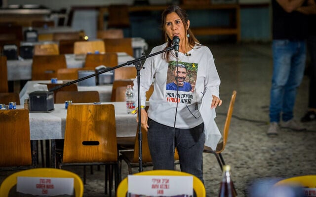 Yael Adar, mother of murdered hostage Tamir Adar, speaks at a pre-Passover event in the Kibbutz Nir Oz dining hall on April 11, 2024. (Photo by Liron Moldovan/Flash90) Yael Adar, mother of murdered hostage Tamir Adar, speaks at a pre-Passover event in the Kibbutz Nir Oz dining hall on April 11, 2024. (Photo by Liron Moldovan/Flash90)