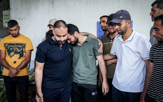 Palestinians bid farewell to their dead relatives at Al-Najjar Hospital, after Israeli air strikes in Gaza's southernmost city of Rafah, April 26, 2024. (Abed Rahim Khatib/Flash90) Palestinians bid farewell to their dead relatives at Al-Najjar Hospital, after Israeli air strikes in Gaza's southernmost city of Rafah, April 26, 2024. (Abed Rahim Khatib/Flash90)