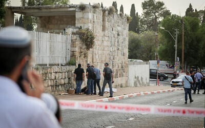 Police at the scene after a stabbing terror attack in Ramle where a 19-year old woman was seriously wounded and the assailant shot dead, April 26, 2024. (Jamal Awad/Flash90)