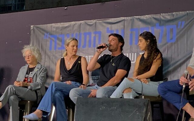 Liron Eldor, father of slain soldier Adi Eldor, speaks at panel in Hostages Square in Tel Aviv on April 23, 2024. (Charlie Summers/Times of Israel)